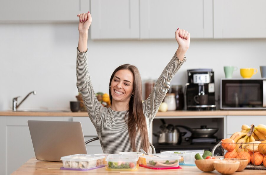 Happy woman doing a healthy prep meals